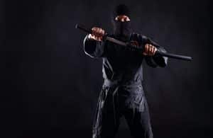 Ninja with katana black background
