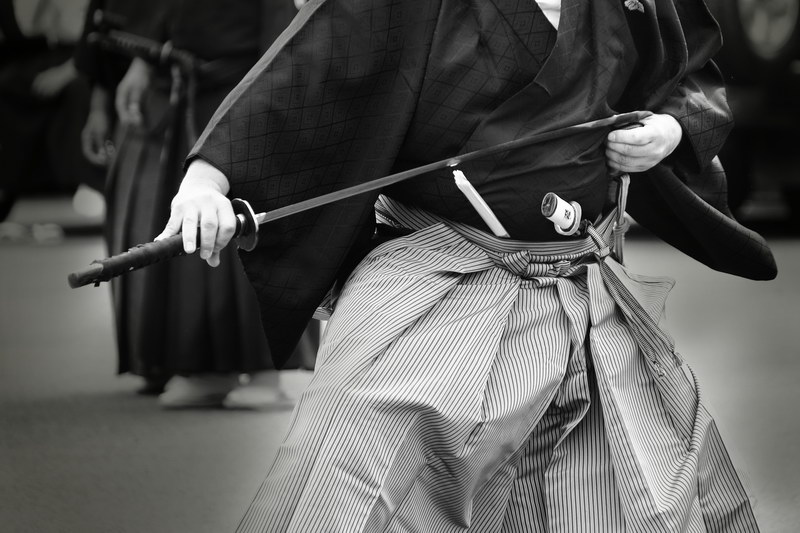 Samurai with sword practicing
